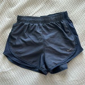 Blue Nike athletic shorts